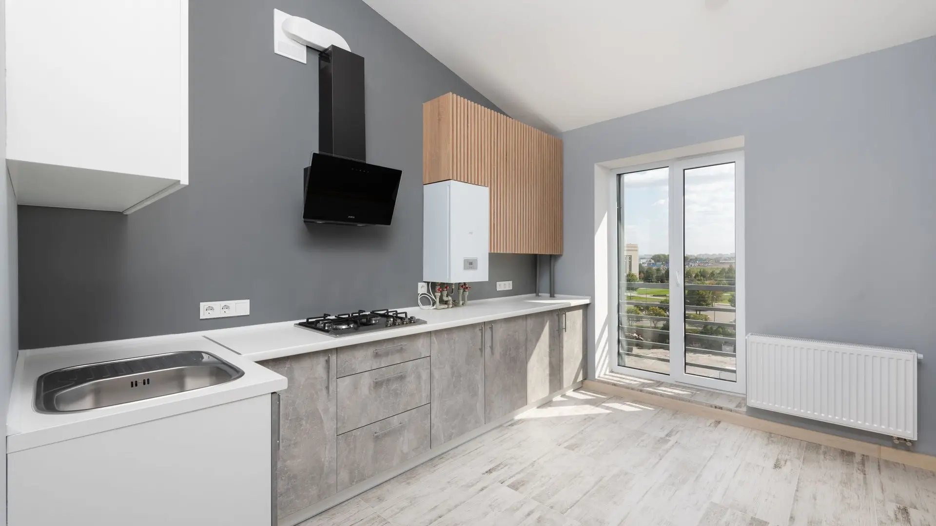 Kitchen with a wall-mounted combi boiler